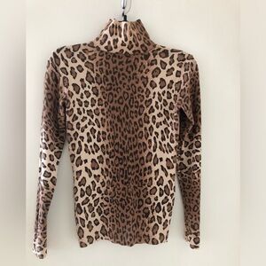 Canadian designer, Brian Bailey design. Leopard Print Turtleneck Top